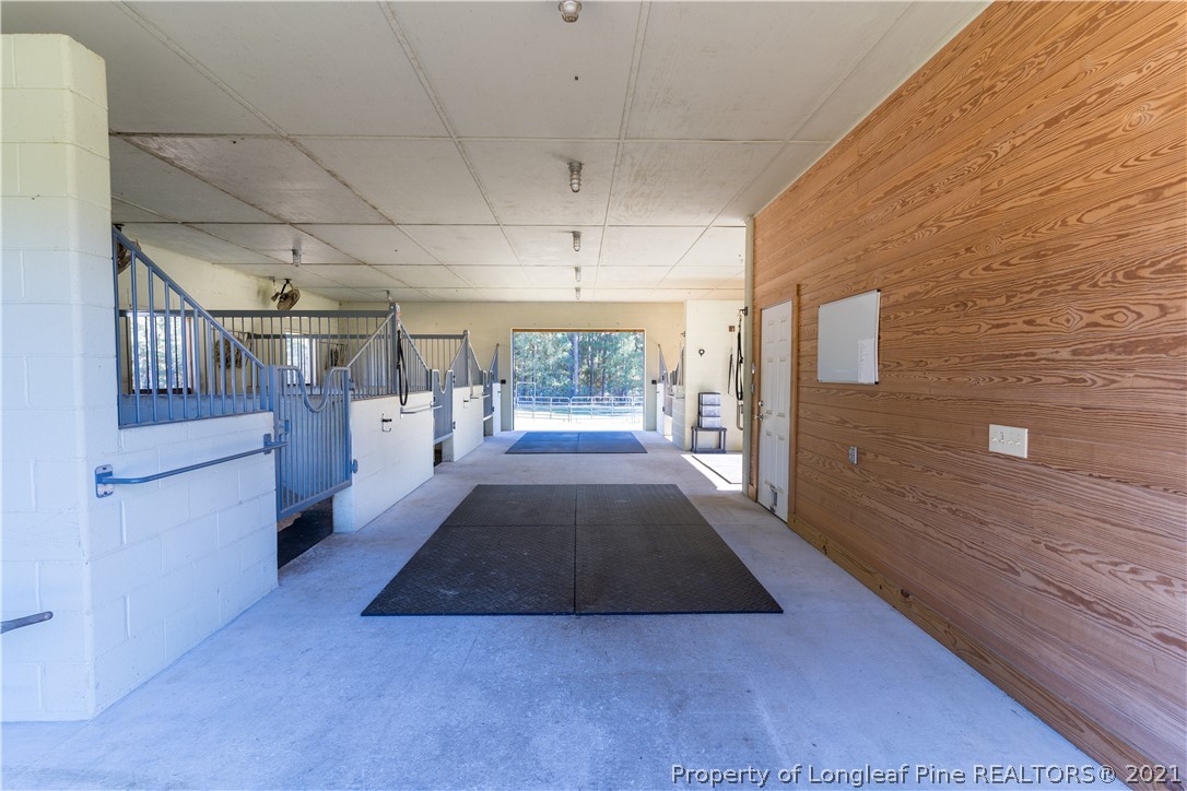 Undisclosed Address Aberdeen, NC 28315 - Photo 29 of 33 a view of hallway with stairs