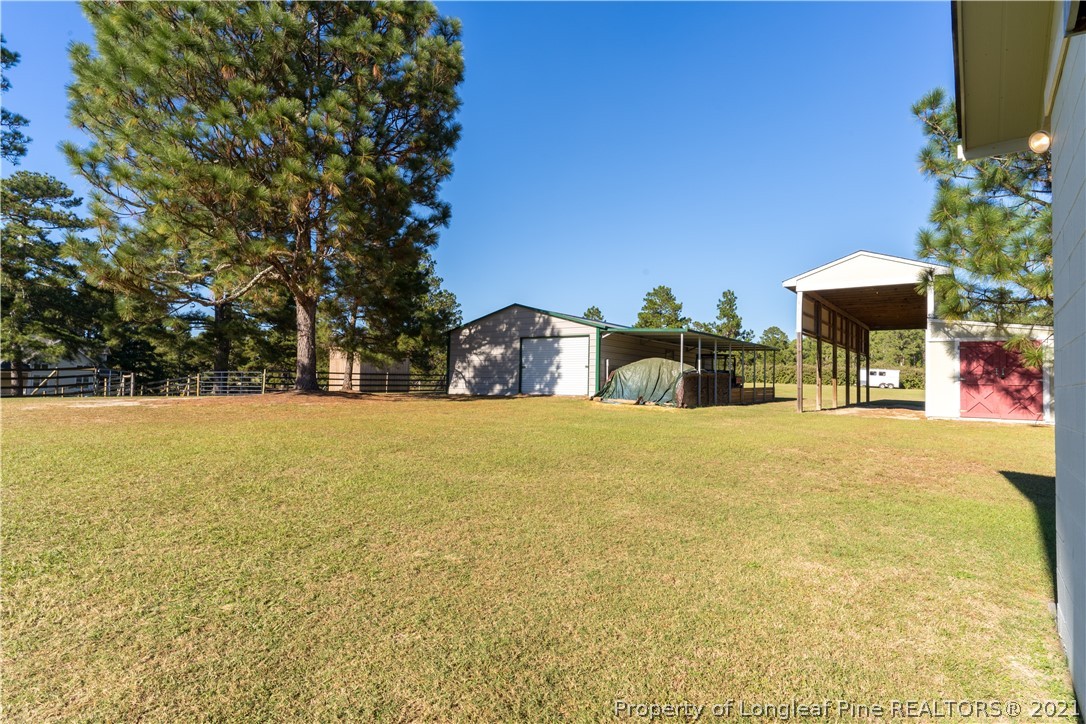 Undisclosed Address Aberdeen, NC 28315 - Photo 33 of 33 a view of swimming pool with an outdoor seating