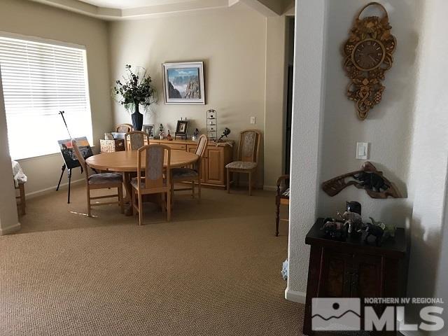 6809 Marble Canyon Road Reno, NV 89511 - Photo 4 of 13 a living room with furniture and wooden floor
