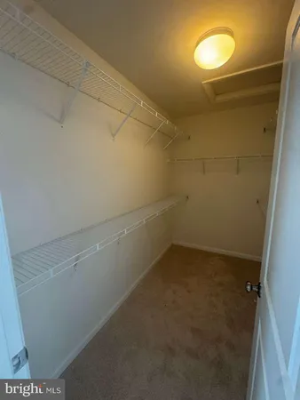 a view of a room with racks on the wall