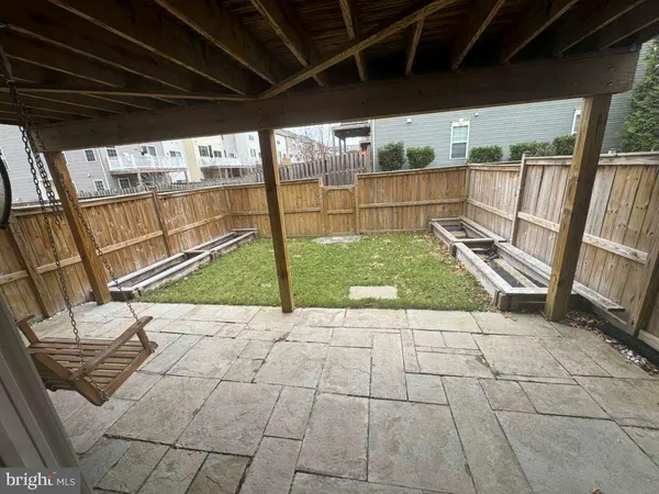 a view of a porch with seating space