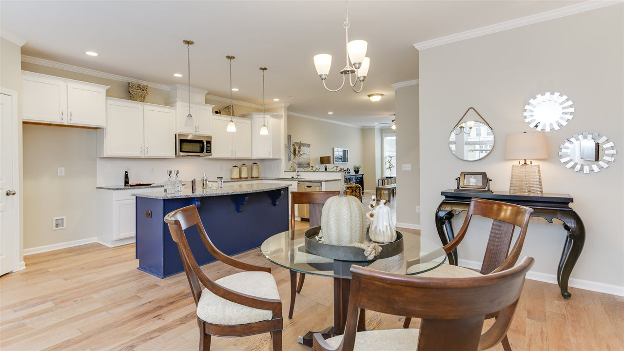 6115 Kayton Street, Unit 2189 Raleigh, NC 27616 - Photo 5 of 17 All photos are of a completed home of same plan and are or representational purposes only. Kitchen/Dining Area
