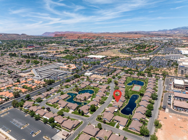 805 South River Road, Unit 70 St. George, UT 84790 - Photo 38 of 38 Aerial perspective of a residential community featuring multiple ponds and green spaces