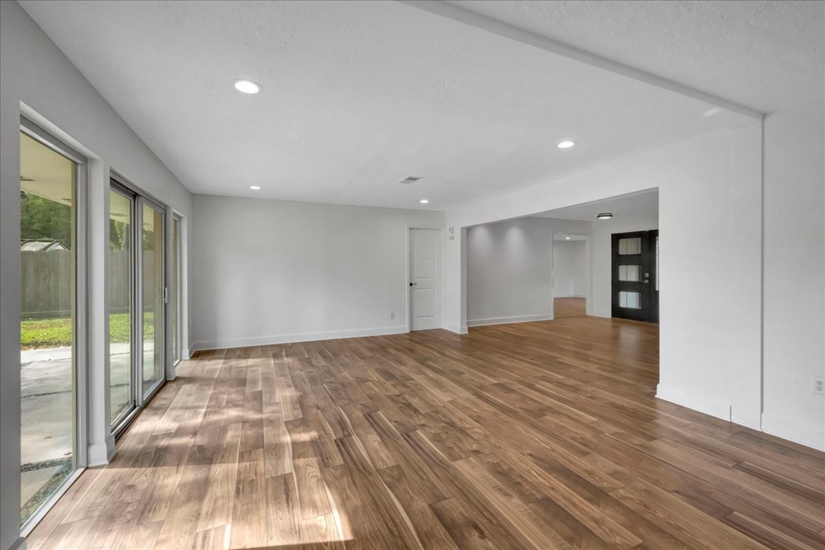 1614 Wavecrest Lane Houston, TX 77062 - Photo 10 of 42 All windows have been replaced. Primary bedroom just beyond the closed white door; Flex room to the right is just off the front entry.