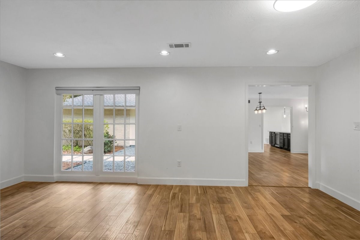 1614 Wavecrest Lane Houston, TX 77062 - Photo 12 of 42 Spacious flex room is located just off front entry. French doors have been sealed off, but can be re-instated or replaced to have a functional double doorway again.