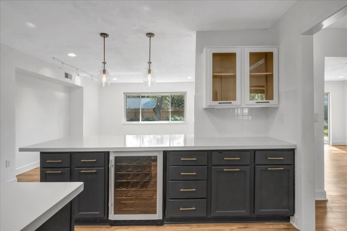 1614 Wavecrest Lane Houston, TX 77062 - Photo 18 of 42 Kitchen includes Wine chiller and is open to the family room.