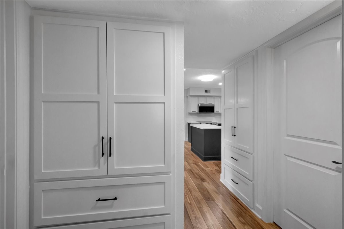 1614 Wavecrest Lane Houston, TX 77062 - Photo 26 of 42 Hallway just off the kitchen leads to 2 bedrooms and a bath. Has lots of storage.