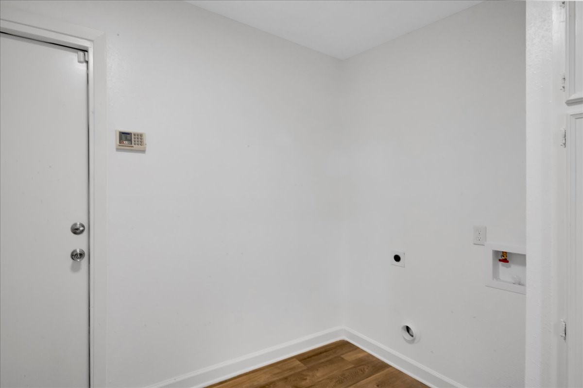 1614 Wavecrest Lane Houston, TX 77062 - Photo 32 of 42 Spacious utility room has washer + electric dryer connections & lots of storage.