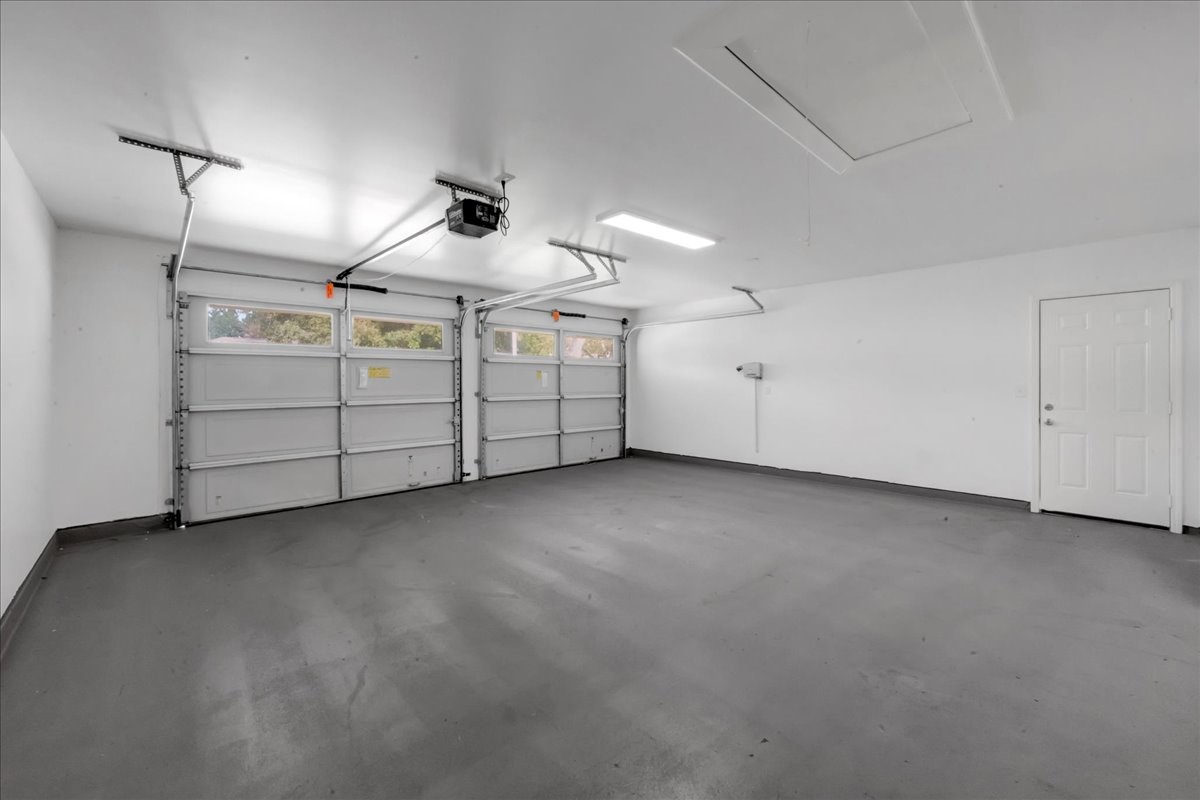 1614 Wavecrest Lane Houston, TX 77062 - Photo 33 of 42 Oversized 2 car garage has new steel exterior pedestrian door, too.