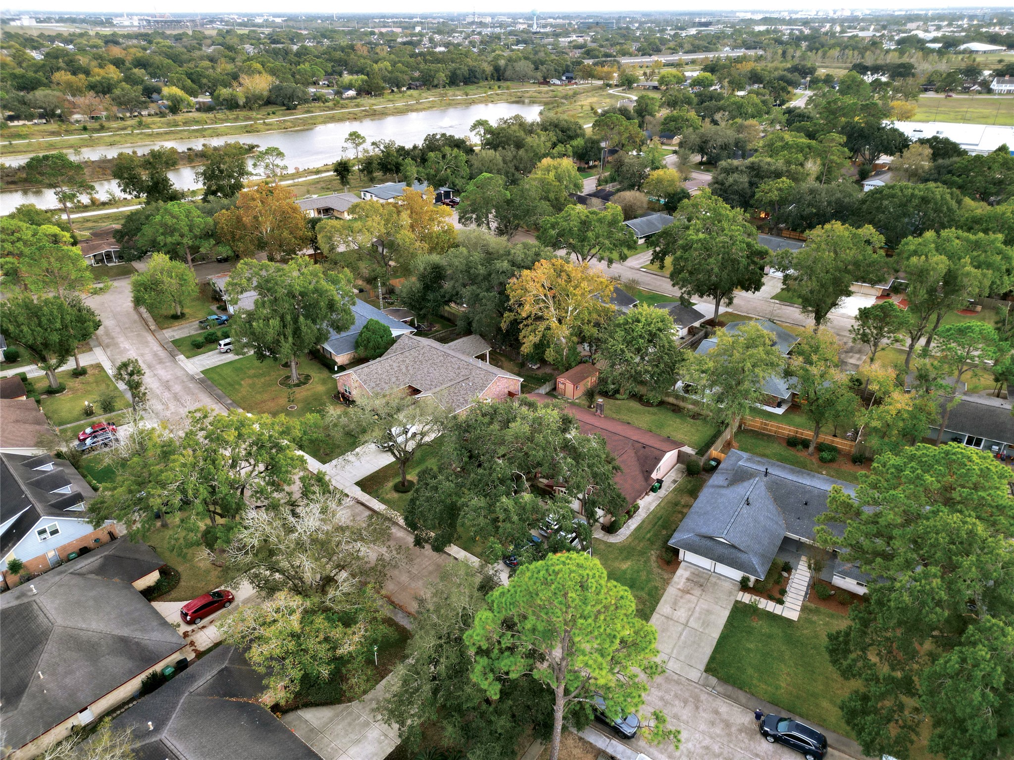 1614 Wavecrest Lane Houston, TX 77062 - Photo 36 of 42 Home (lower right corner of the photo) is walking distance from Exploration Green waterfront walking trails (see top left of the photo) and walking / bike ride from Clear Lake City Elementary, pictured top right of the photo (see white roof).