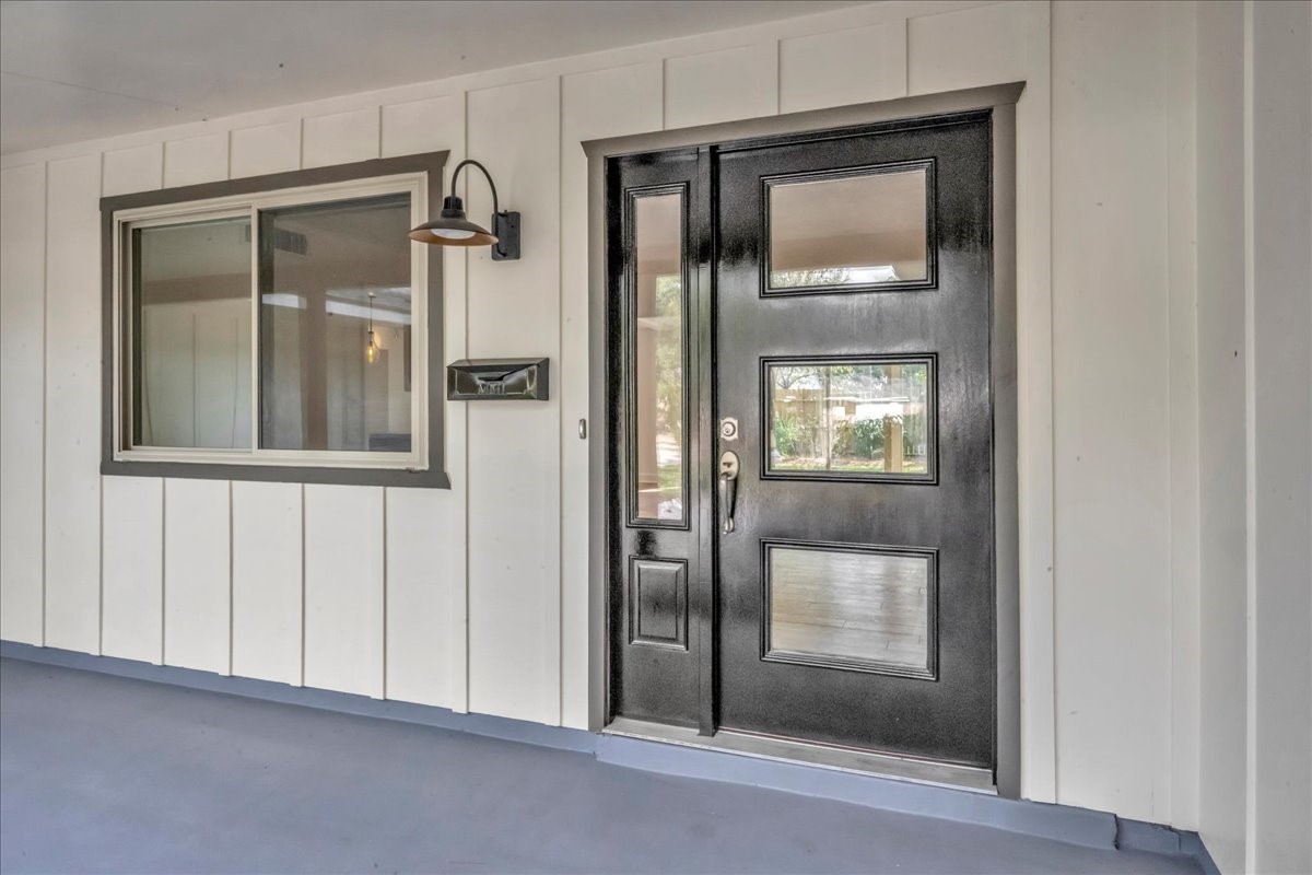 1614 Wavecrest Lane Houston, TX 77062 - Photo 5 of 42 This home features dynamic modern front door with modern hardware.