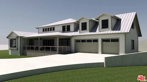 a kitchen with stainless steel appliances a stove and a microwave