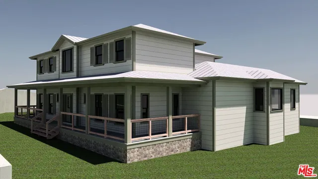 a view of large white house with a large windows