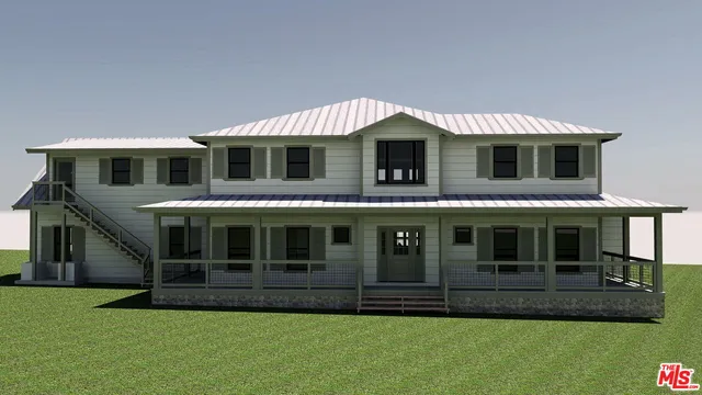 a view of a garden with mountains in the background