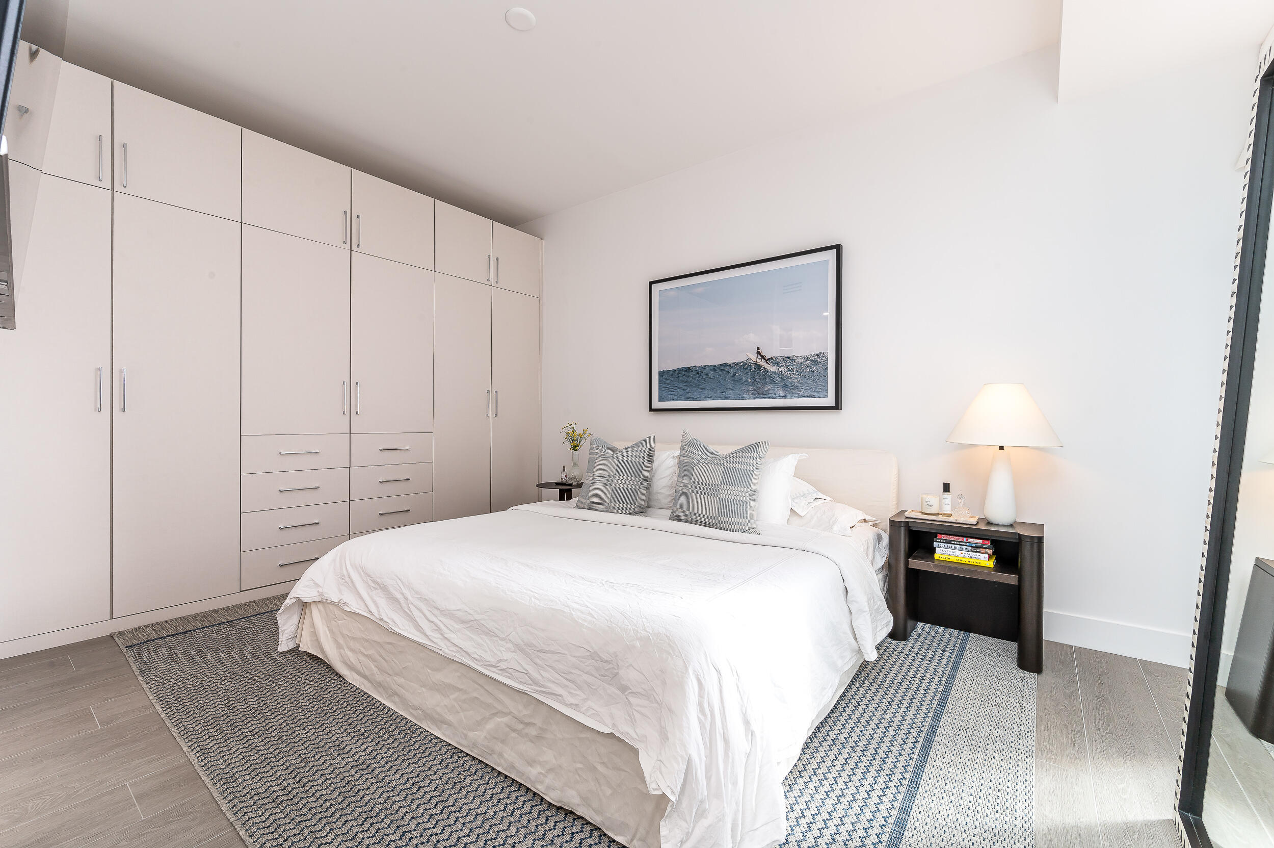 155 East Boca Raton Road, Unit 1008 Boca Raton, FL 33432 - Photo 8 of 42 a bedroom with a bed and a painting on the wall