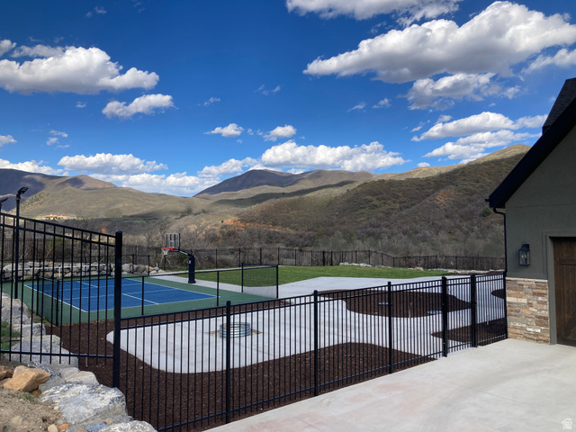 259 Meadow Drive Springville, UT 84663 - Photo 58 of 62 View of swimming pool featuring a mountain view, patio surround, and basketball hoop