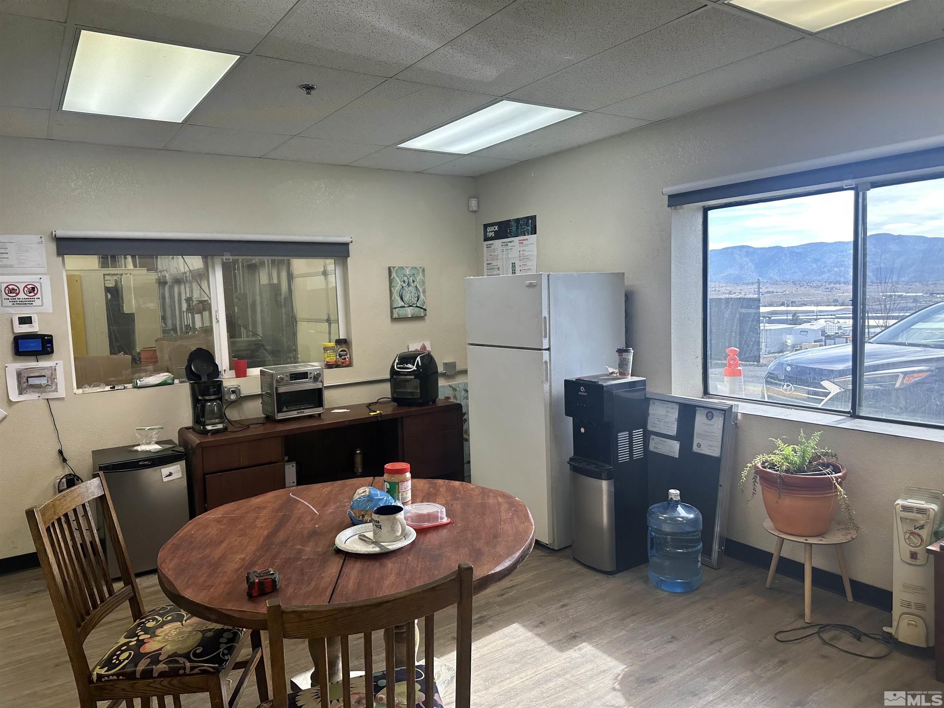 27 Bruce Way Carson City, NV 89706 - Photo 7 of 9 a view of a dining room with furniture window and outside view