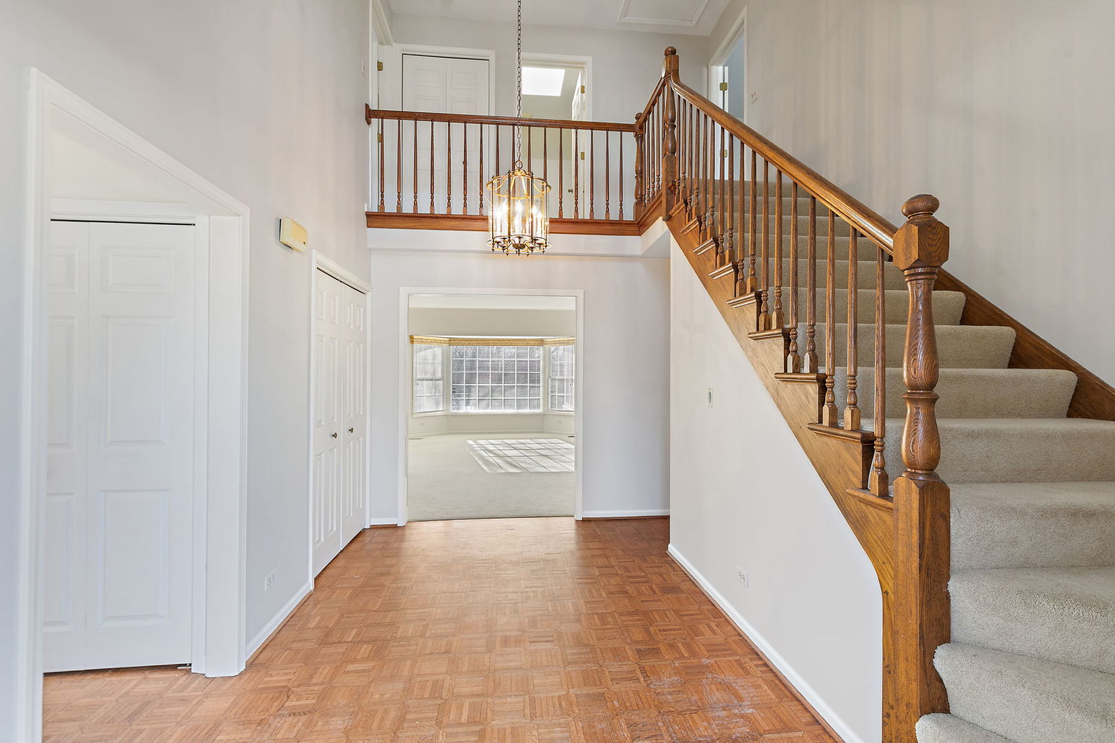 43 North Ravenscraig Lane Inverness, IL 60067 - Photo 2 of 64 a view of entryway and hall with wooden floor