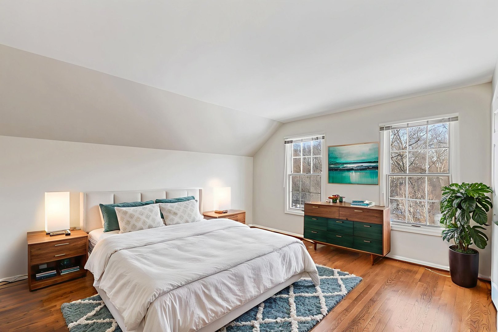 43 North Ravenscraig Lane Inverness, IL 60067 - Photo 29 of 64 a bedroom with a bed and a potted plant