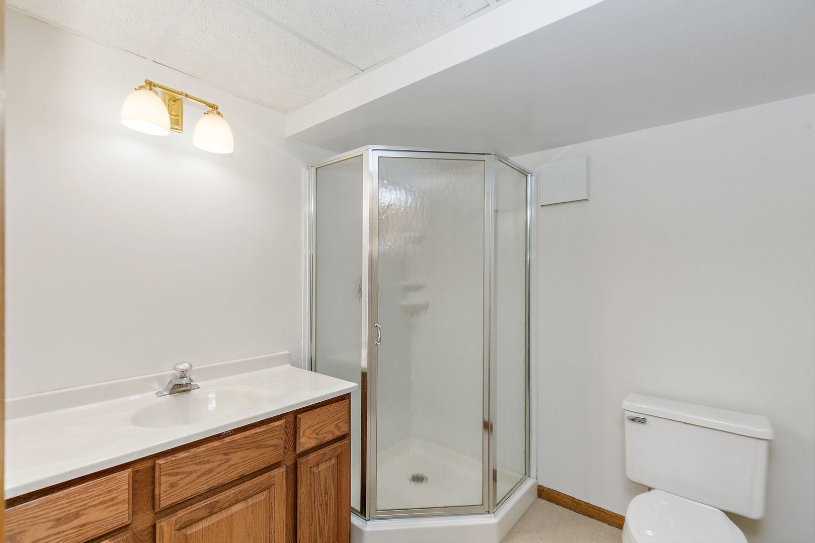 43 North Ravenscraig Lane Inverness, IL 60067 - Photo 33 of 64 a bathroom with a granite countertop sink toilet and shower