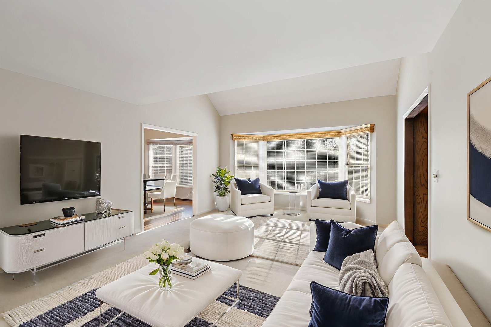 43 North Ravenscraig Lane Inverness, IL 60067 - Photo 4 of 64 a living room with furniture and a flat screen tv