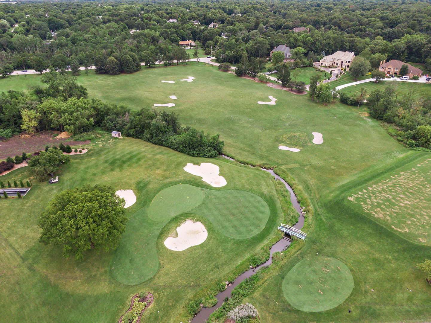 43 North Ravenscraig Lane Inverness, IL 60067 - Photo 62 of 64 a view of a golf course with a lake