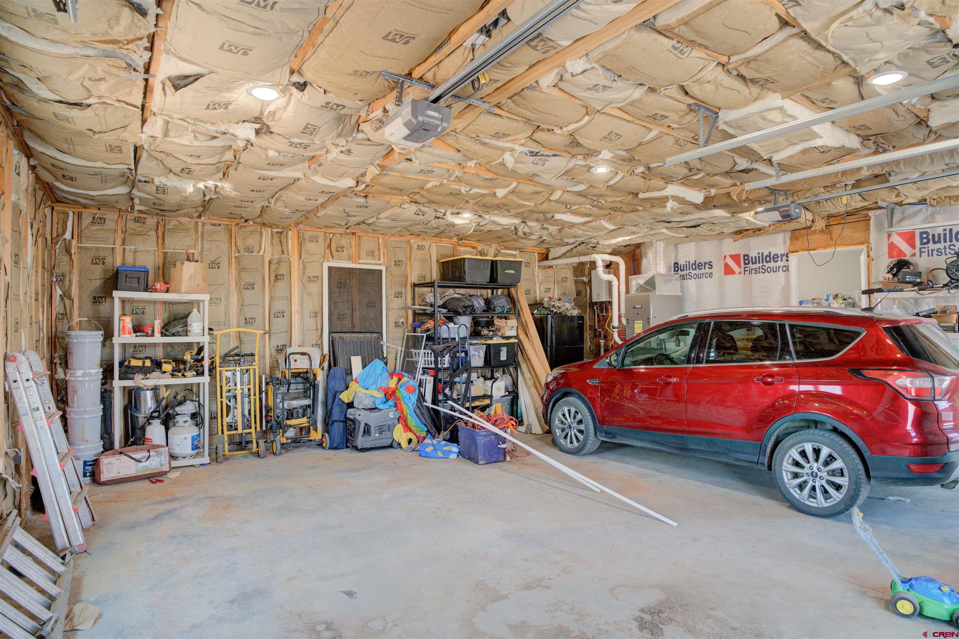 13205 Road 17.9 Loop Cortez, CO 81321 - Photo 34 of 35 a view of parking garage with cars