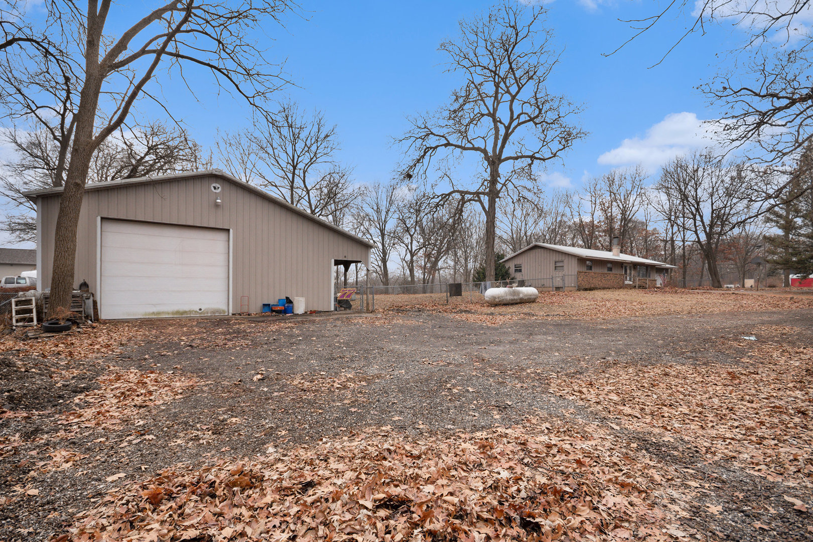 13090 River Road Plano, IL 60545 - Photo 20 of 27 a view of a house with a snow