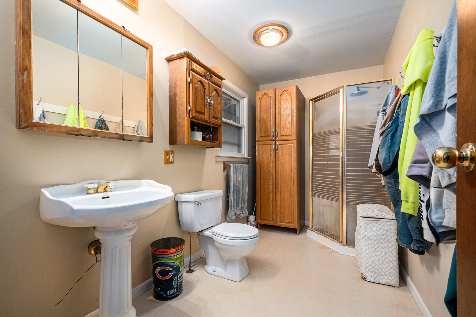 13090 River Road Plano, IL 60545 - Photo 10 of 27 a bathroom with a sink toilet and shower