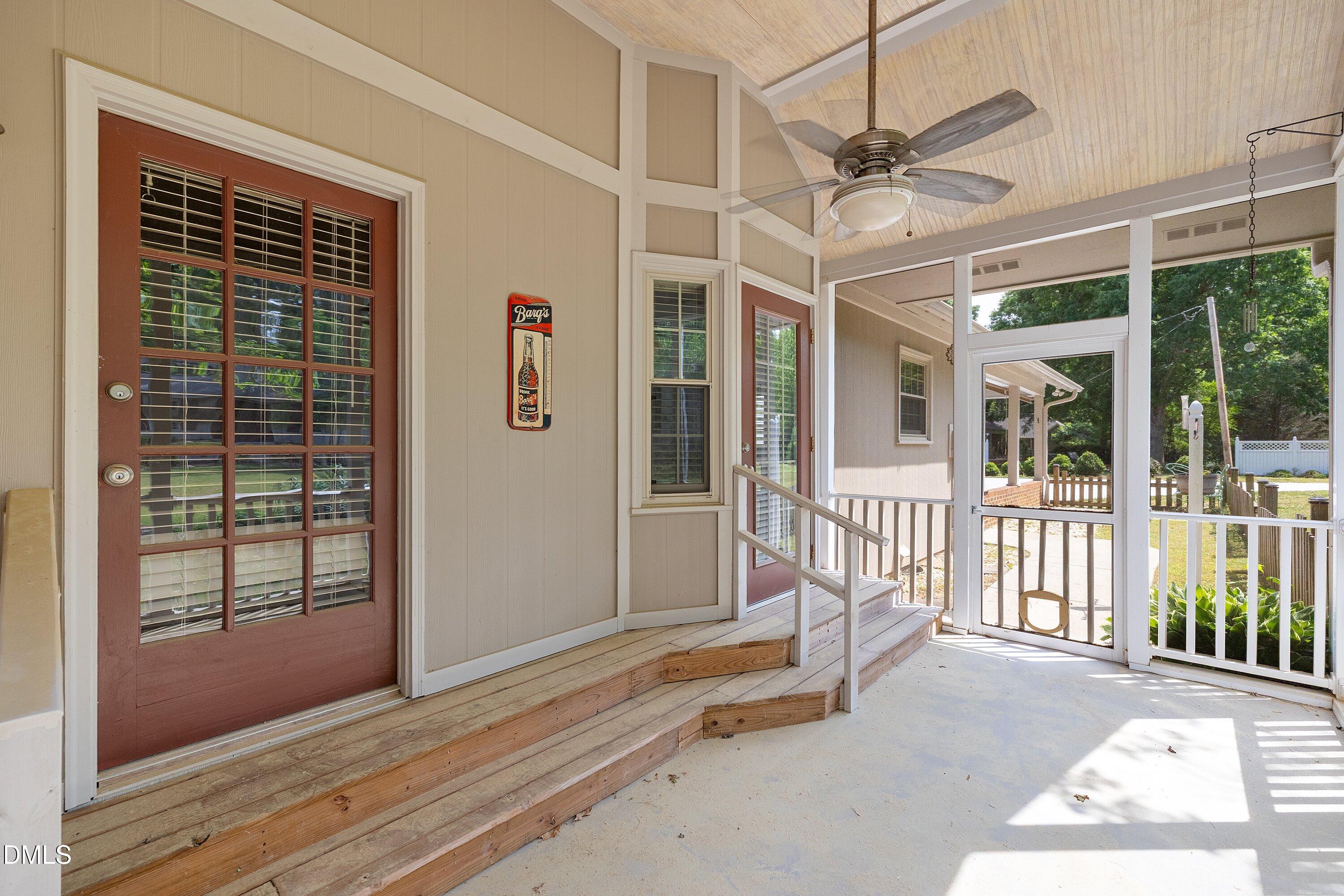 8133 Holly Forest Road Wake Forest, NC 27587 - Photo 43 of 50 a view of a balcony with a ceiling fan
