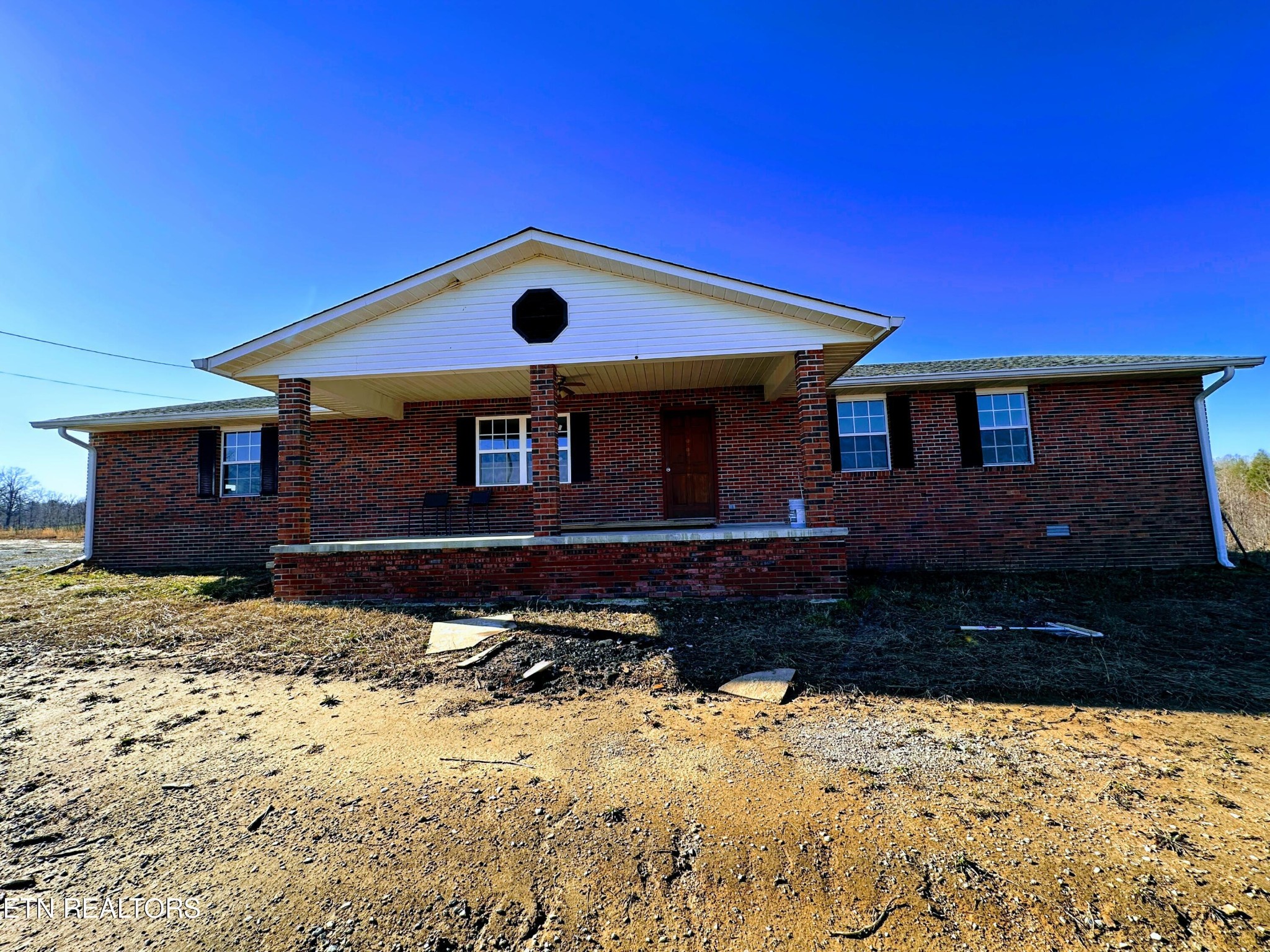 5472 Banner-Roslin Road Clarkrange, TN 38553 - Photo 3 of 21 a front view of a house with a yard
