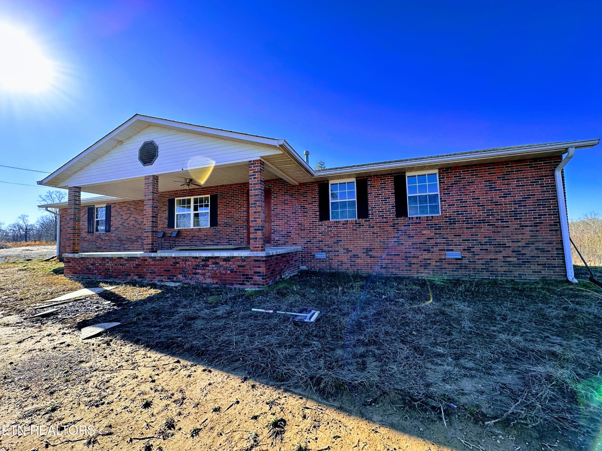 5472 Banner-Roslin Road Clarkrange, TN 38553 - Photo 4 of 21 a front view of a house with garden