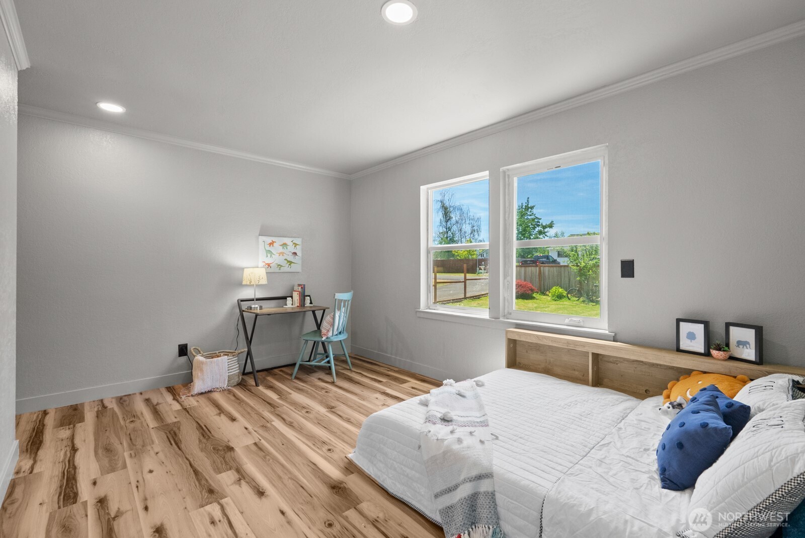 307 4th Street Steilacoom, WA 98388 - Photo 22 of 39 a bedroom with a bed and a window