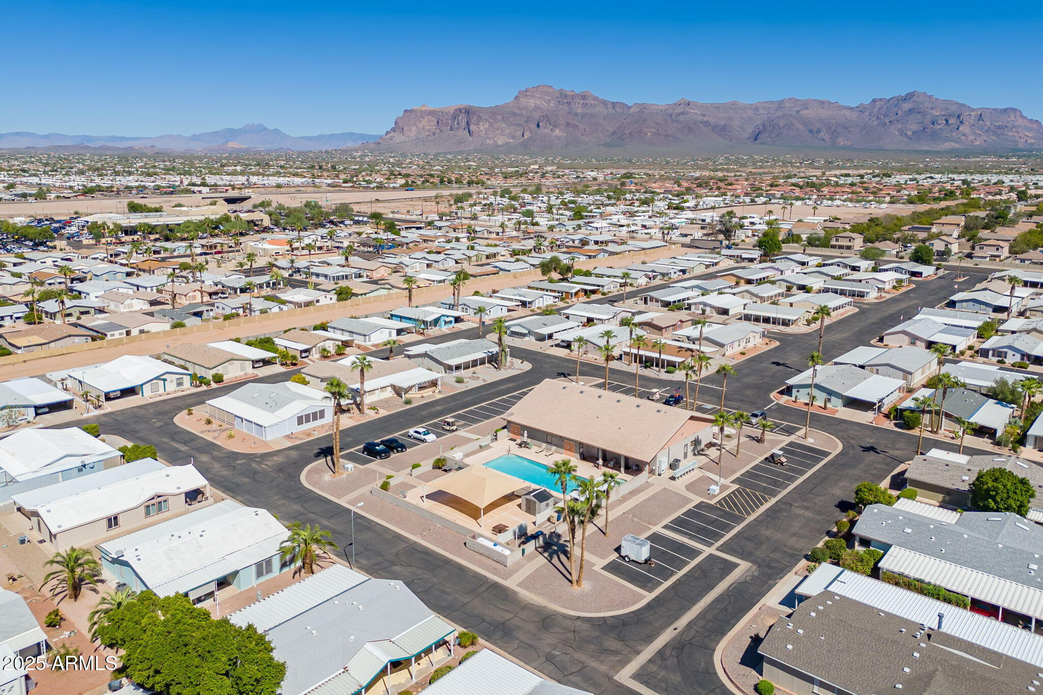 3700 South Tomahawk Road, Unit 39 Apache Junction, AZ 85119 - Photo 9 of 53 an aerial view of residential house with parking