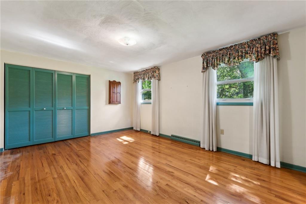 2213 Hall Drive Export, PA 15632 - Photo 19 of 36 an empty room with windows and closet