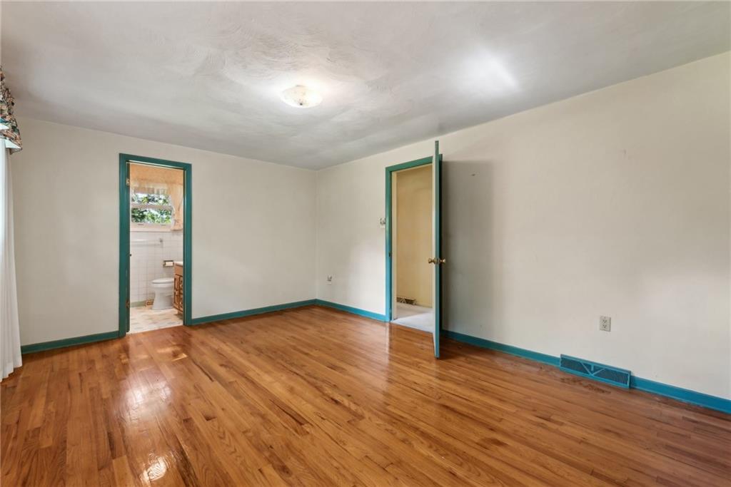 2213 Hall Drive Export, PA 15632 - Photo 20 of 36 an empty room with wooden floor and closet