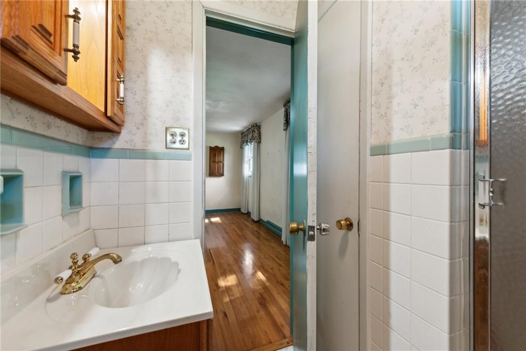 2213 Hall Drive Export, PA 15632 - Photo 21 of 36 a bathroom with a sink and shower