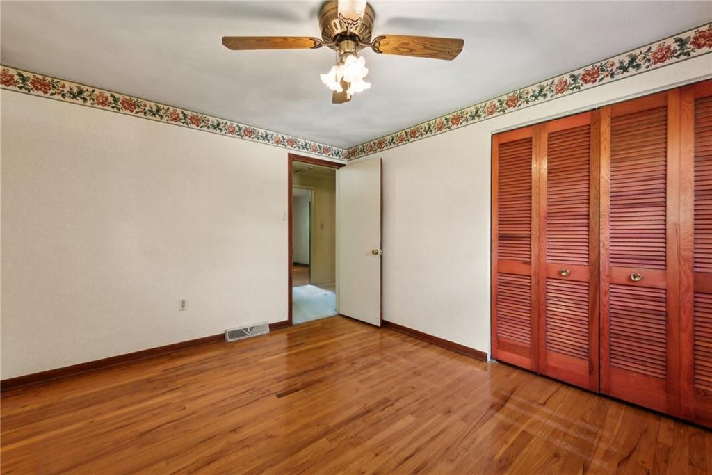 2213 Hall Drive Export, PA 15632 - Photo 23 of 36 wooden floor in an empty room