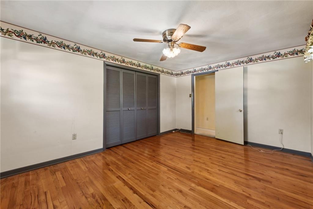 2213 Hall Drive Export, PA 15632 - Photo 25 of 36 a view of empty room with wooden floor and fan