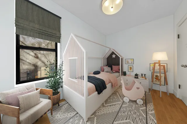 a bedroom with a bed and a window