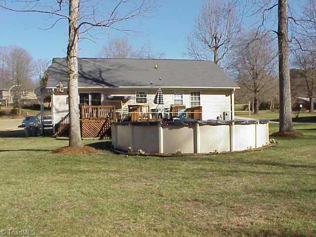 209 Whispering Creek Road King, NC 27021 - Photo 3 of 9 Other. Nice back deck with direct access to above ground pool.