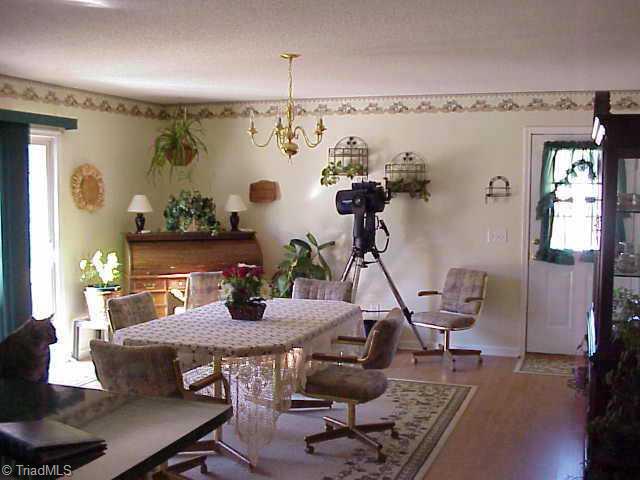 209 Whispering Creek Road King, NC 27021 - Photo 7 of 9 Other. Large dining room area.