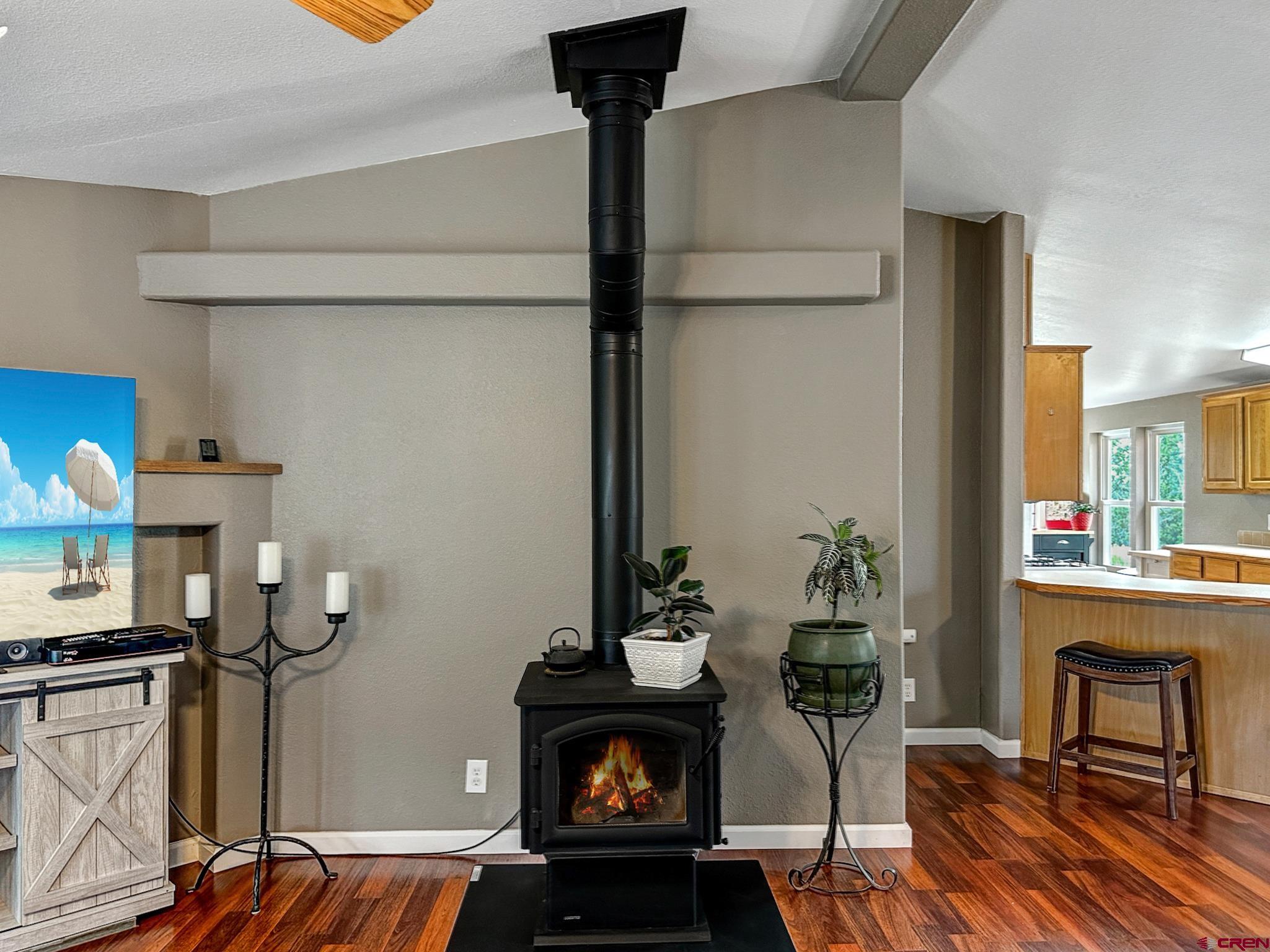 29501 P50 Road Hotchkiss, CO 81419 - Photo 12 of 45 a living room with furniture and a fireplace