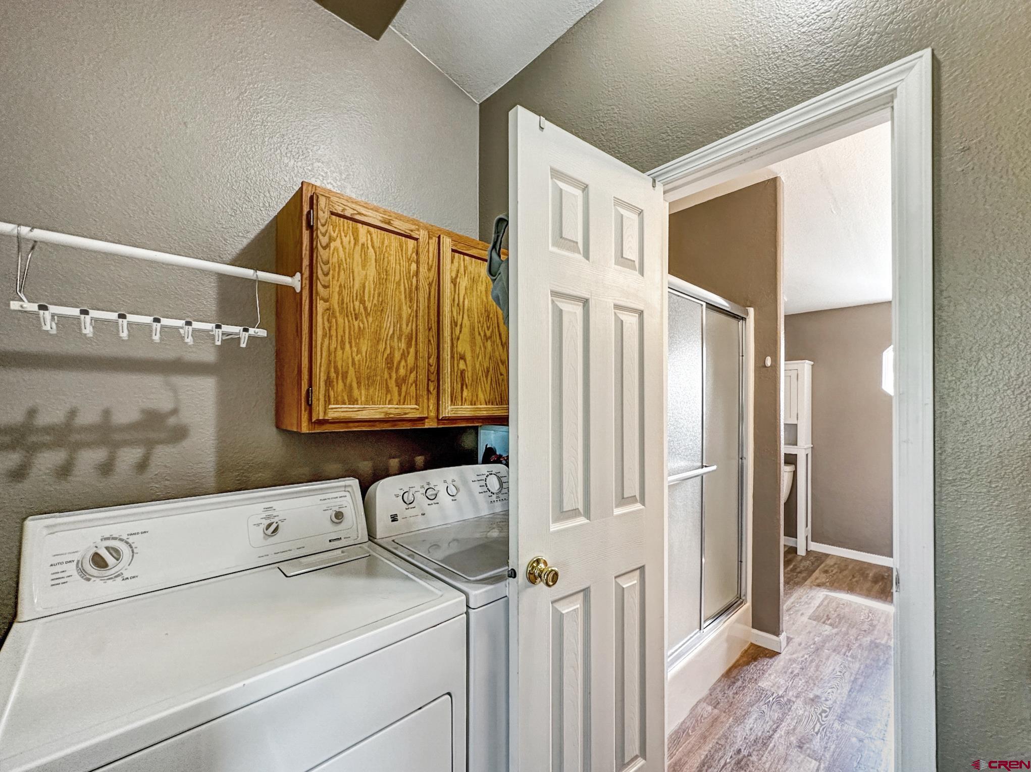 29501 P50 Road Hotchkiss, CO 81419 - Photo 19 of 45 a bathroom with a granite countertop sink and a mirror