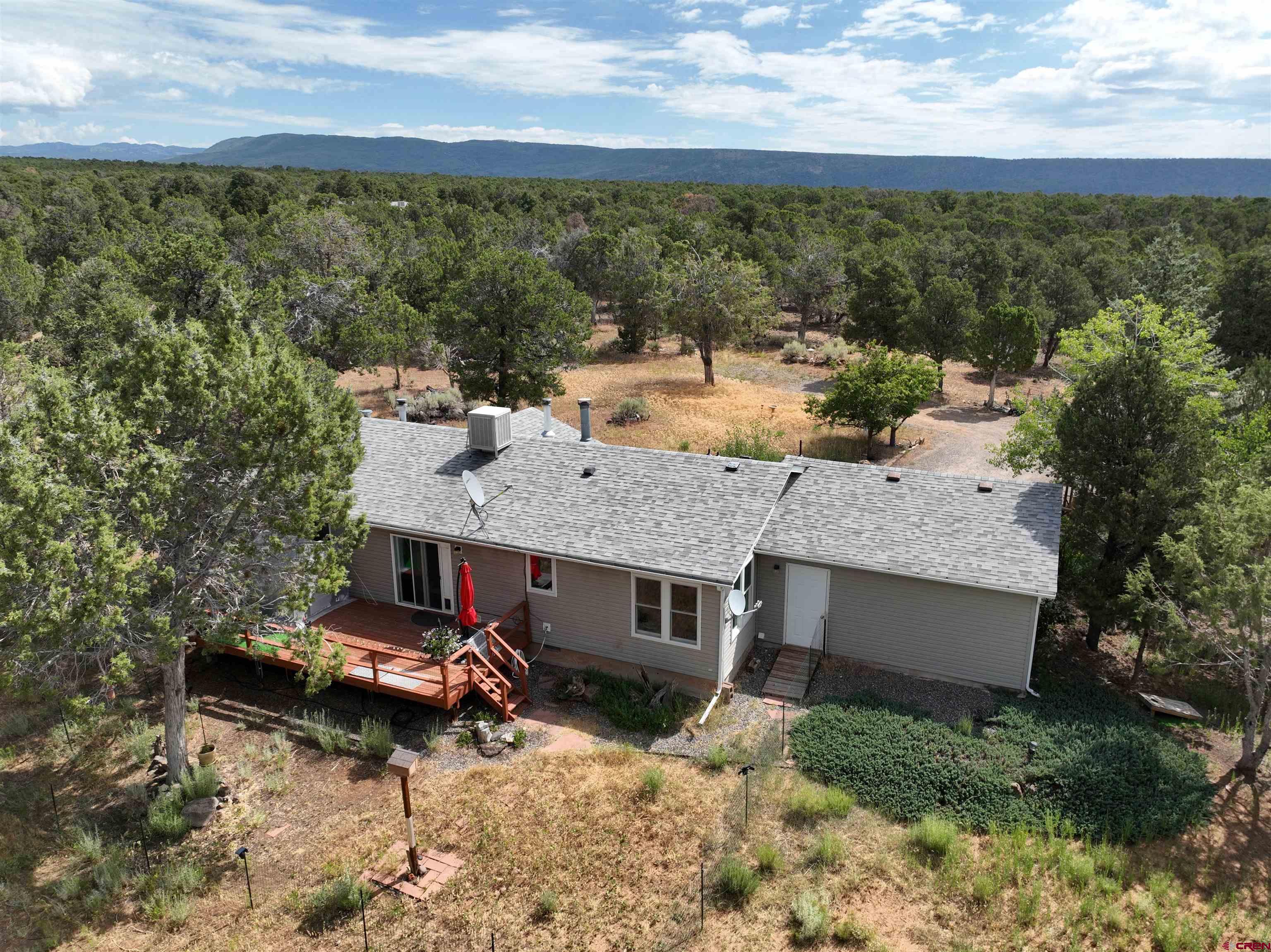 29501 P50 Road Hotchkiss, CO 81419 - Photo 28 of 45 an aerial view of a house with a yard basket ball court and outdoor seating