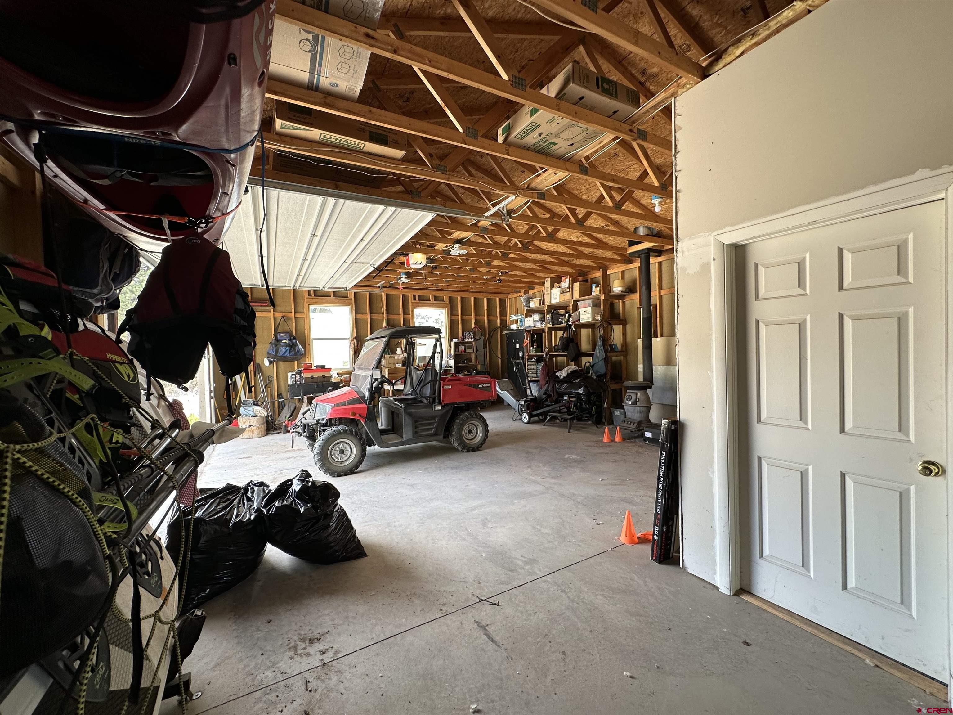 29501 P50 Road Hotchkiss, CO 81419 - Photo 31 of 45 a view of a garage with a white car parked