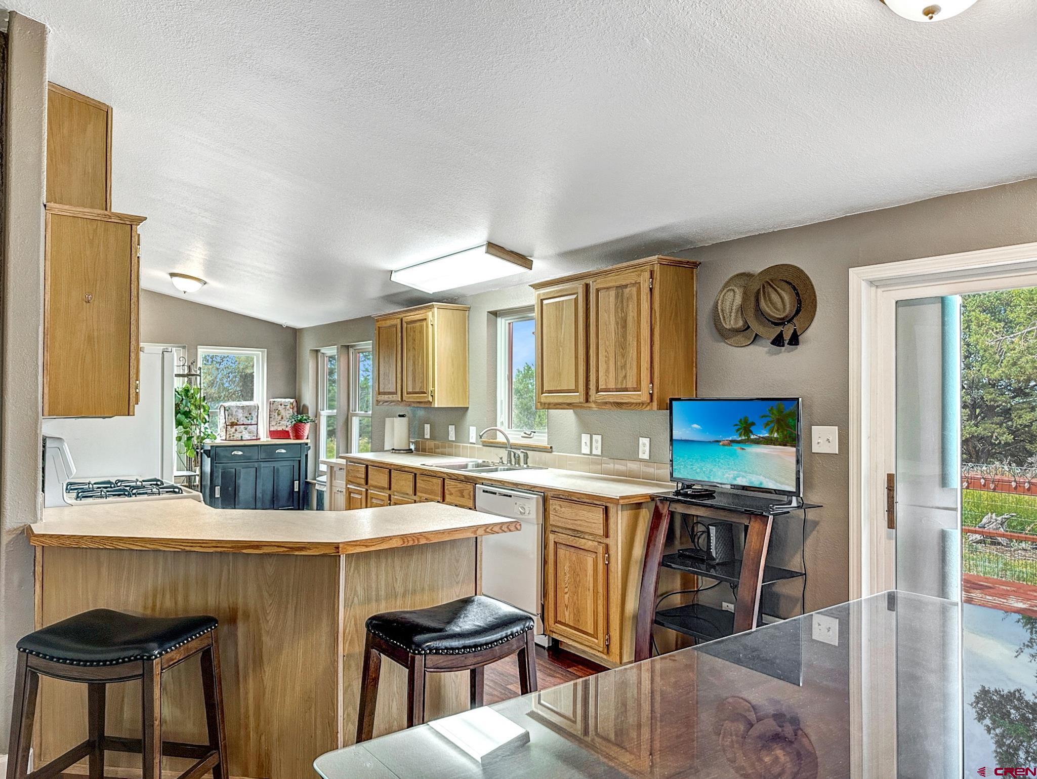 29501 P50 Road Hotchkiss, CO 81419 - Photo 7 of 45 a kitchen with a sink cabinets and window