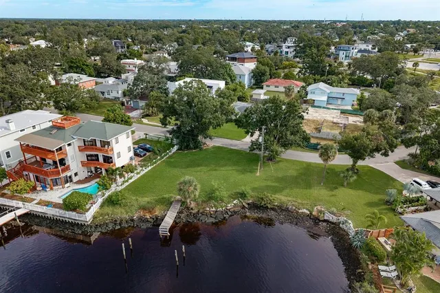 a view of a golf course with a lake