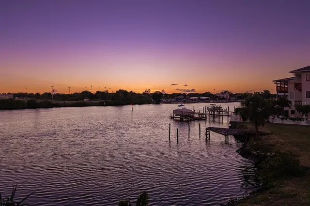a view of a city street and a mountain