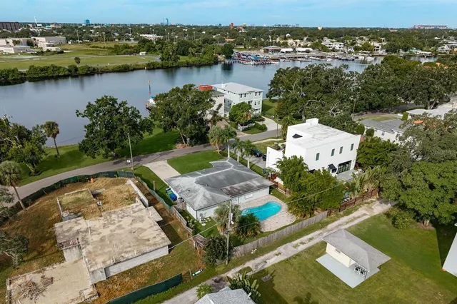 a view of a garden with lawn chairs